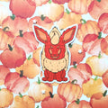 A die-cut sticker featuring a pumpkin fox, centered on a background of watercolor pumpkins in shades of orange, red, and yellow.